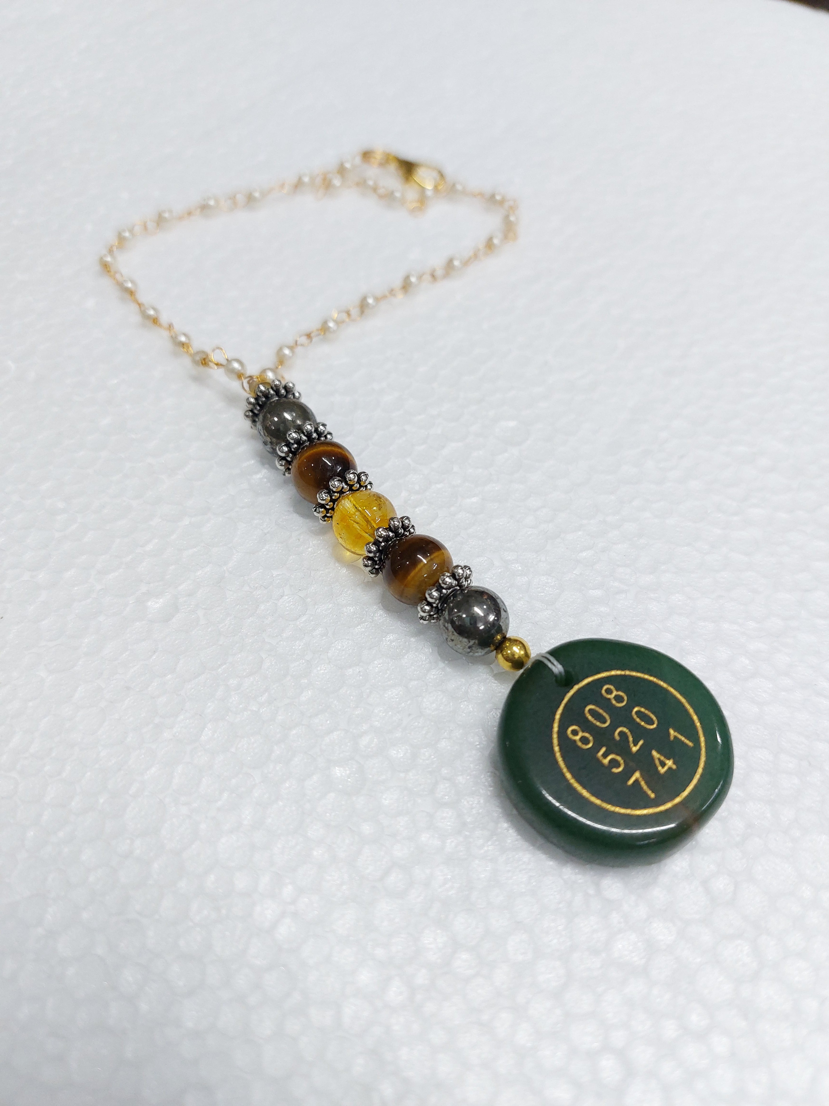 MONEY MAGNET ZIBU CRYSTAL RAKHI