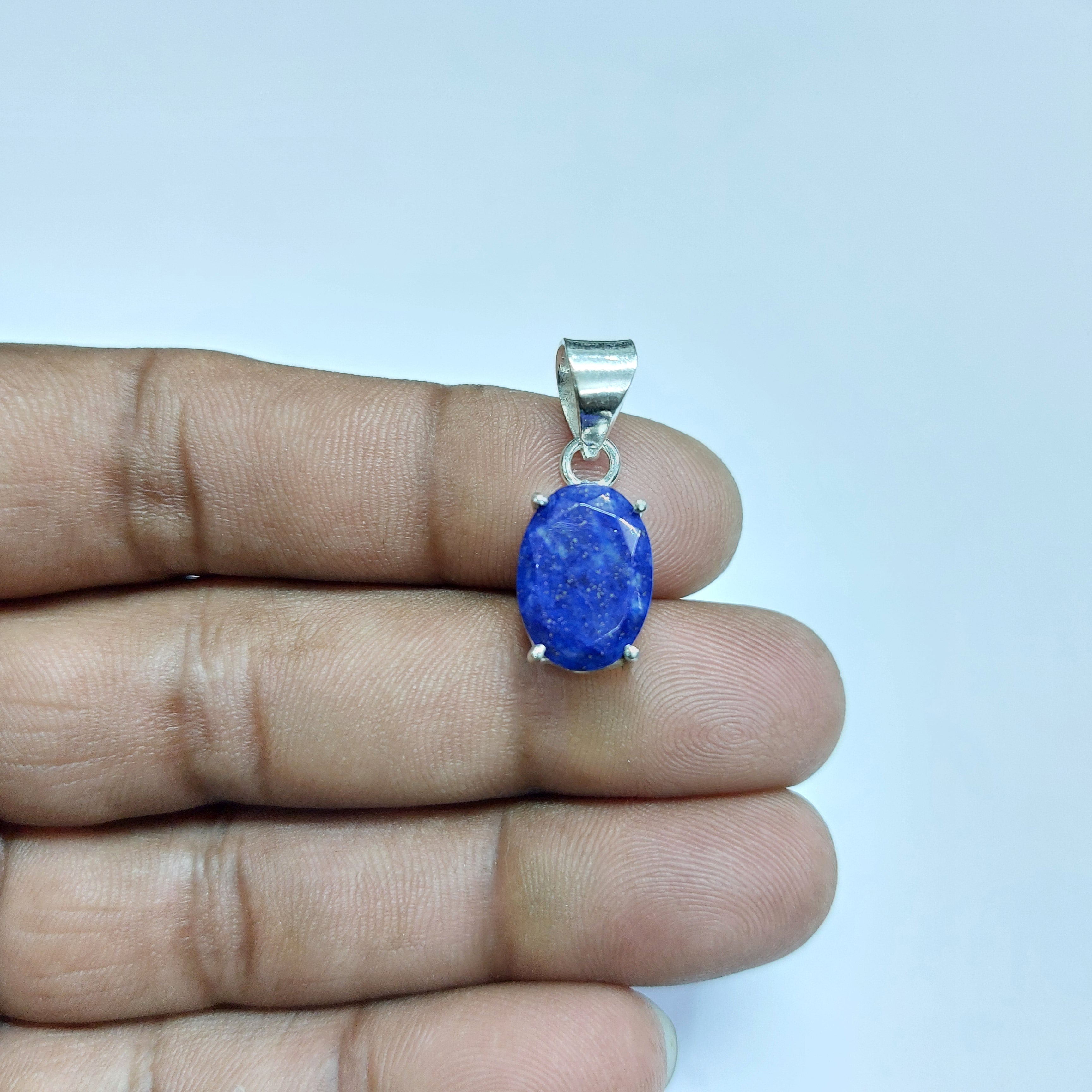 NATURAL LAPIS FACETED OVAL PENDENT