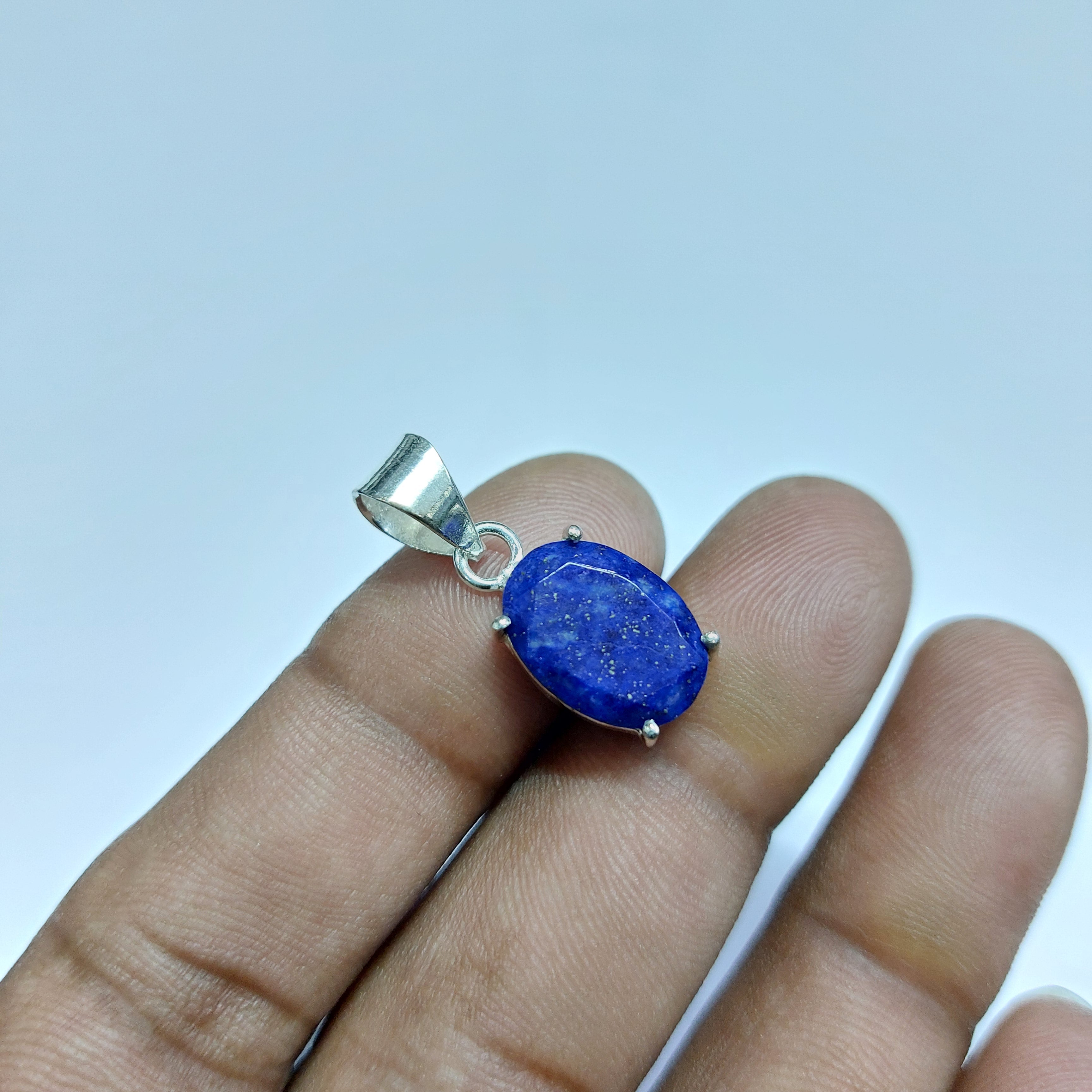 NATURAL LAPIS FACETED OVAL PENDENT