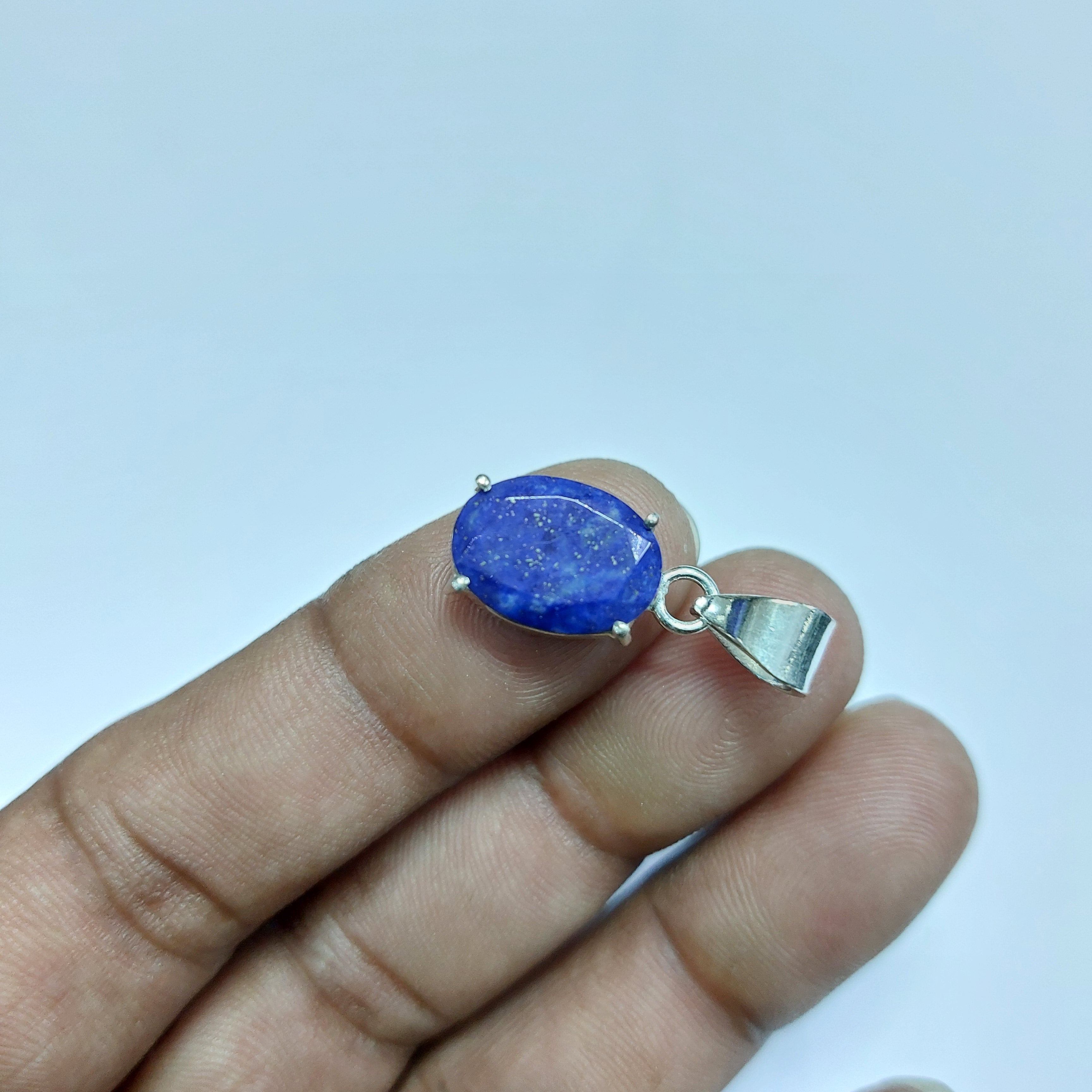 NATURAL LAPIS FACETED OVAL PENDENT