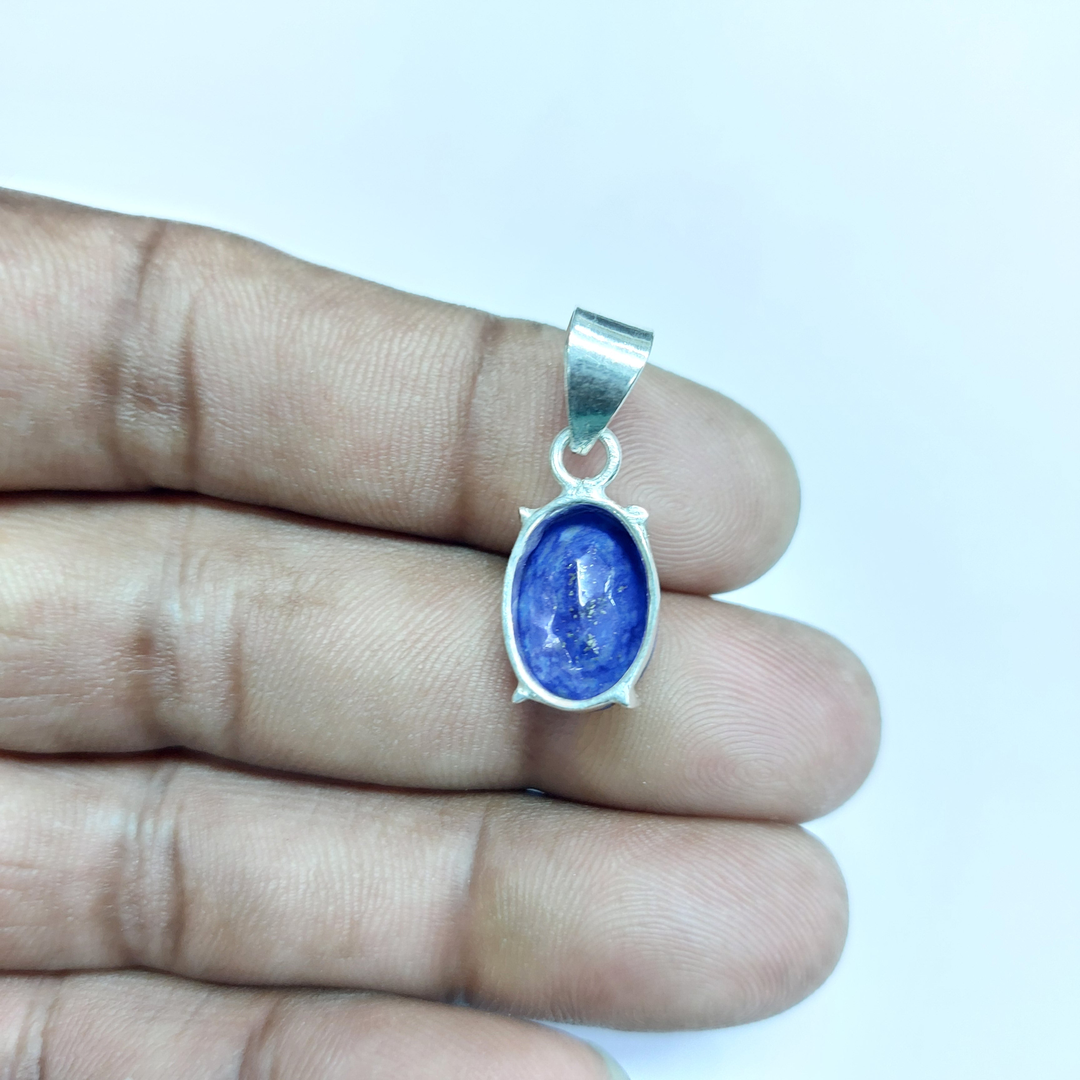 NATURAL LAPIS FACETED OVAL PENDENT