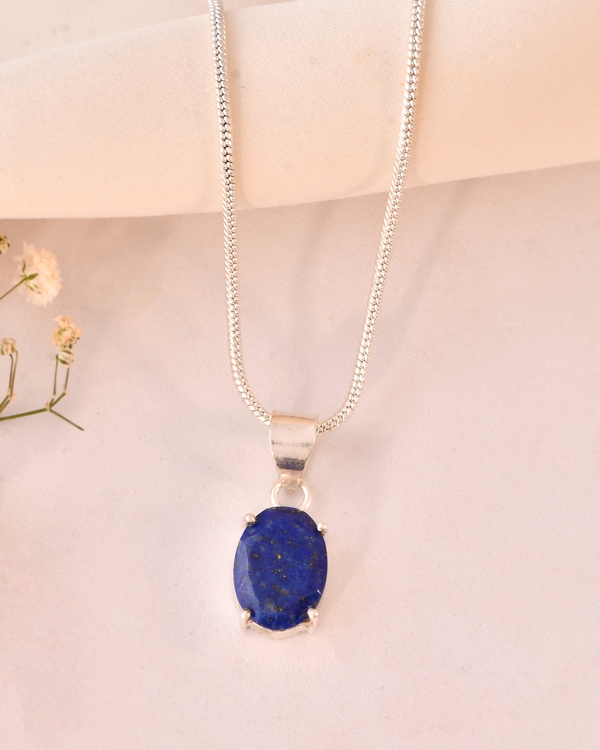 NATURAL LAPIS FACETED OVAL PENDENT