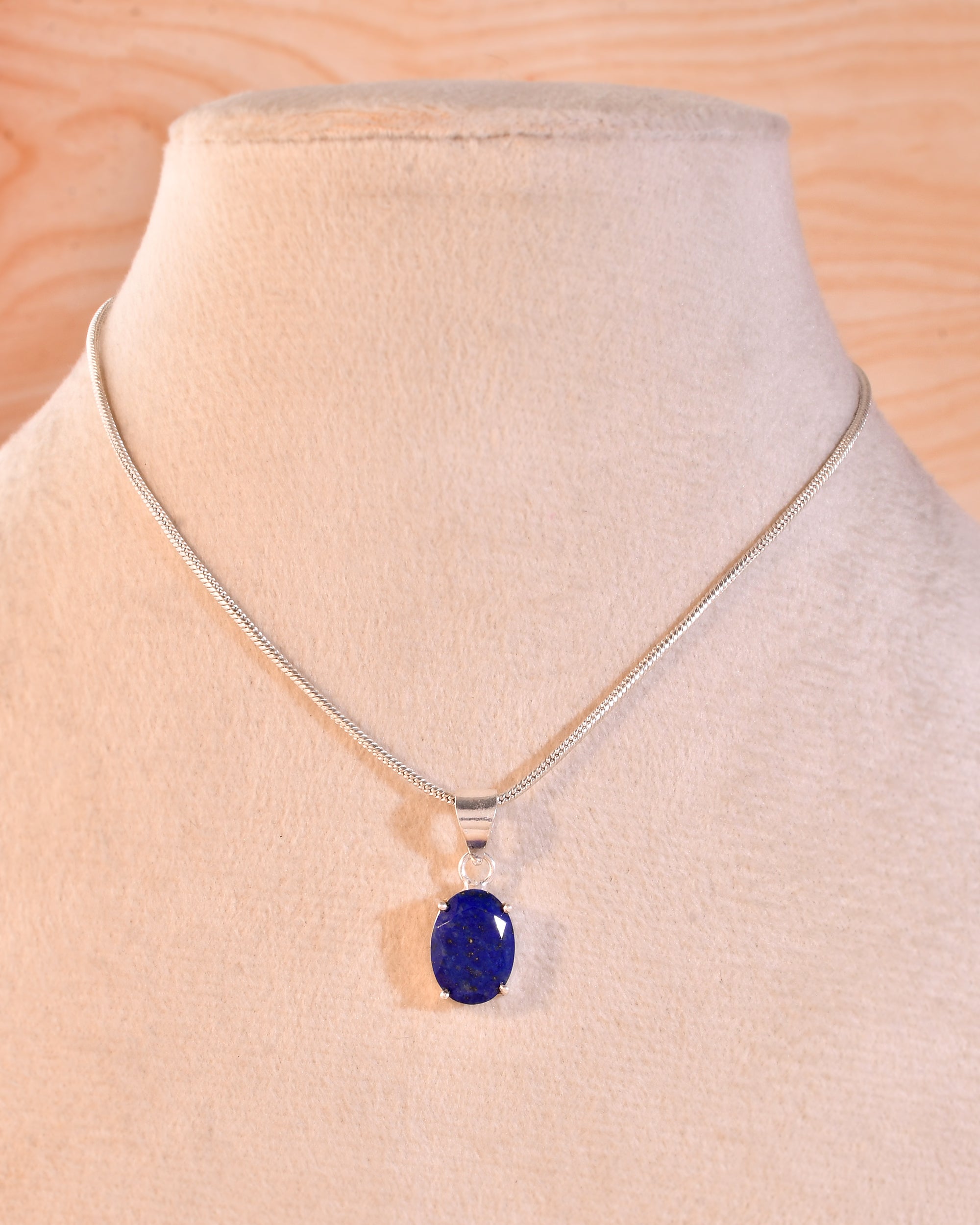 NATURAL LAPIS FACETED OVAL PENDENT