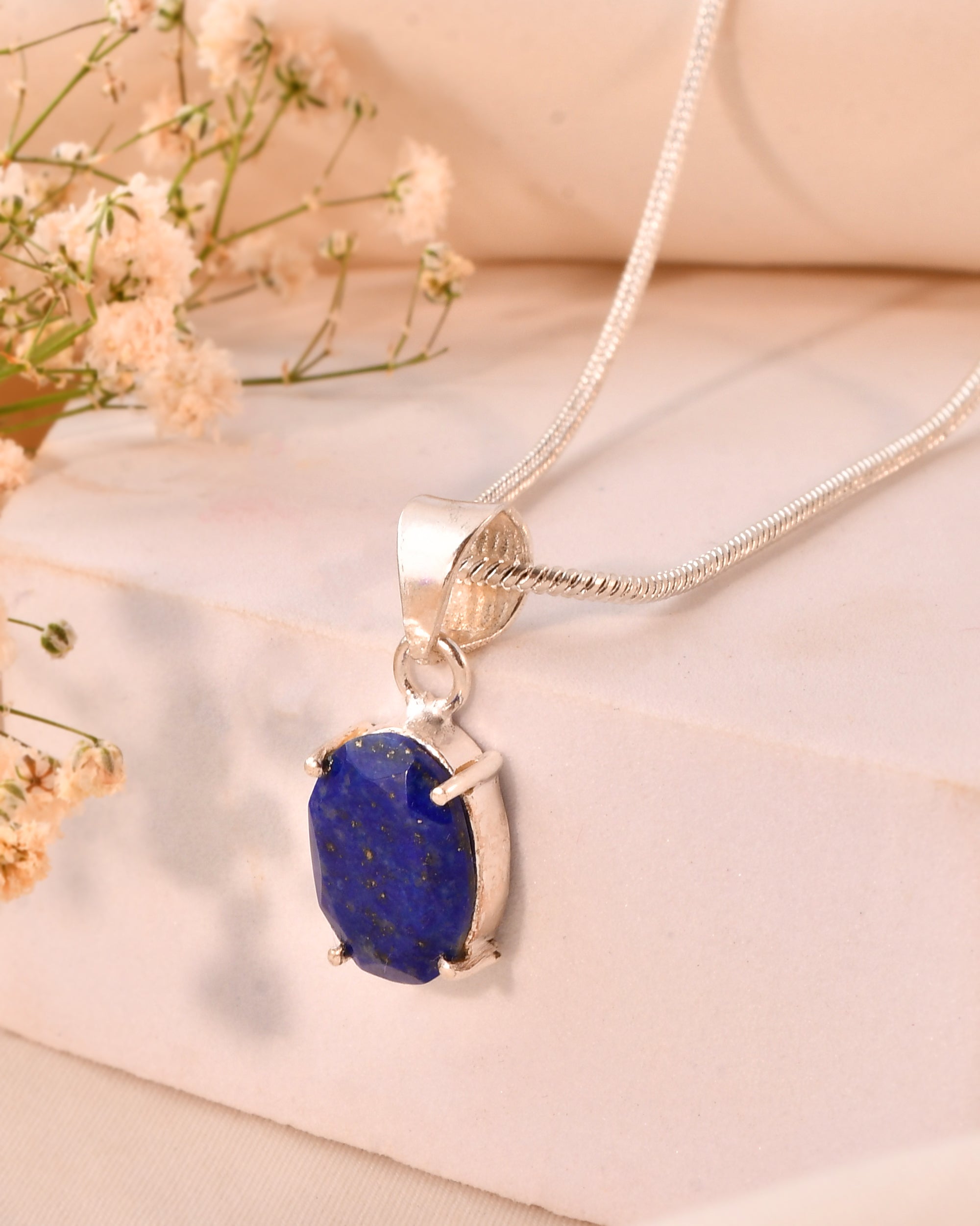 NATURAL LAPIS FACETED OVAL PENDENT